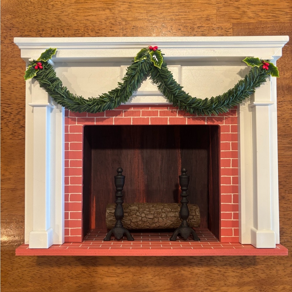 Charming Holiday Fireplace Decor with Green Garland